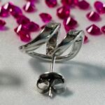 Twisted Open Knot CZ Stud Earrings in Rhodium Silver - Image 2