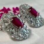 Ruby Red Center Round Halo Stud Earrings in Rhodium Silver - Image 3