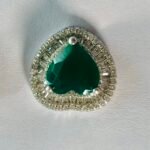 Shield Cut Green Stone Halo Stud Earrings in Rhodium Silver
