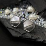 Geometric Hexagon Mother of Pearl Stud Earrings in Rhodium Silver - Image 2