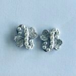 Pave CZ Ribbon Knot Stud Earrings in Rhodium Silver