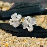 Pave CZ Ribbon Knot Stud Earrings in Rhodium Silver - Image 2