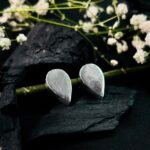 Smooth Teardrop Stud Earrings in Rhodium Silver - Image 2